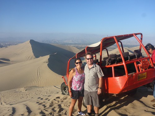 Us in front of the buggy and dunes